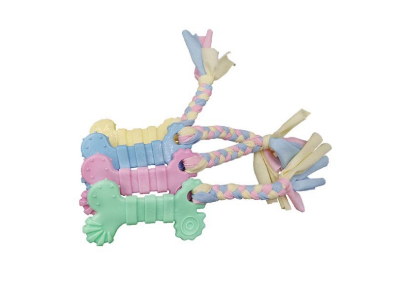 A Pet Toy With Small Bones At The Four Corners Of A Cloth Strip