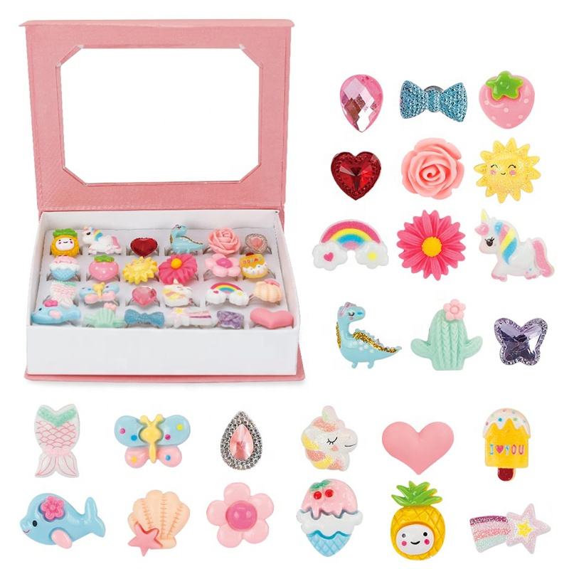 24 Ring Toys and a Pink Jewelry Box