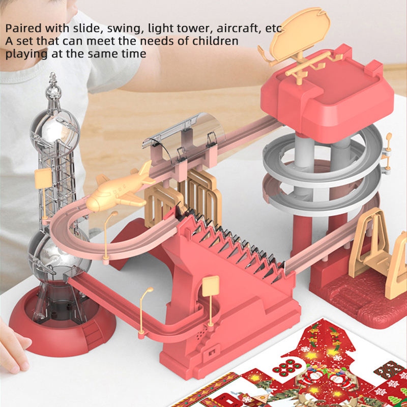 Christmas Orbital Slide Toys Set includes a slide, swing, lighthouse, airplane, and more