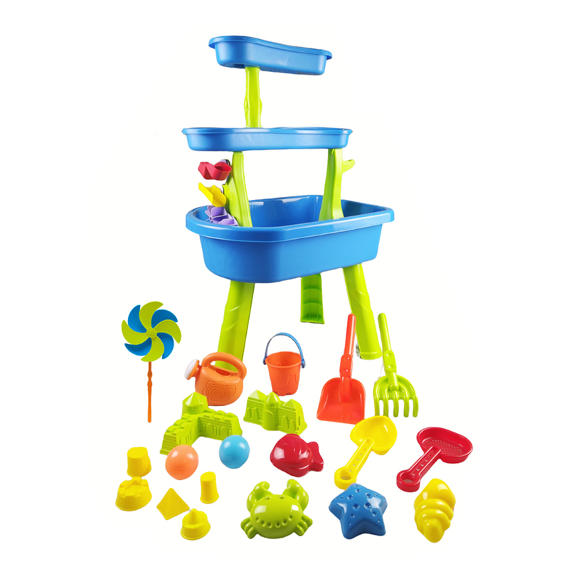 A three-tiered blue-green Sand & Water Table and a variety of colorful beach toys
