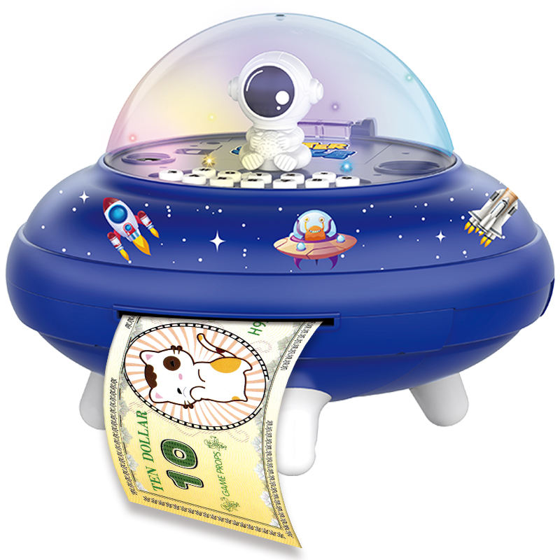 A $10 game banknote is inserted into the blue UFO Smart Piggy Bank