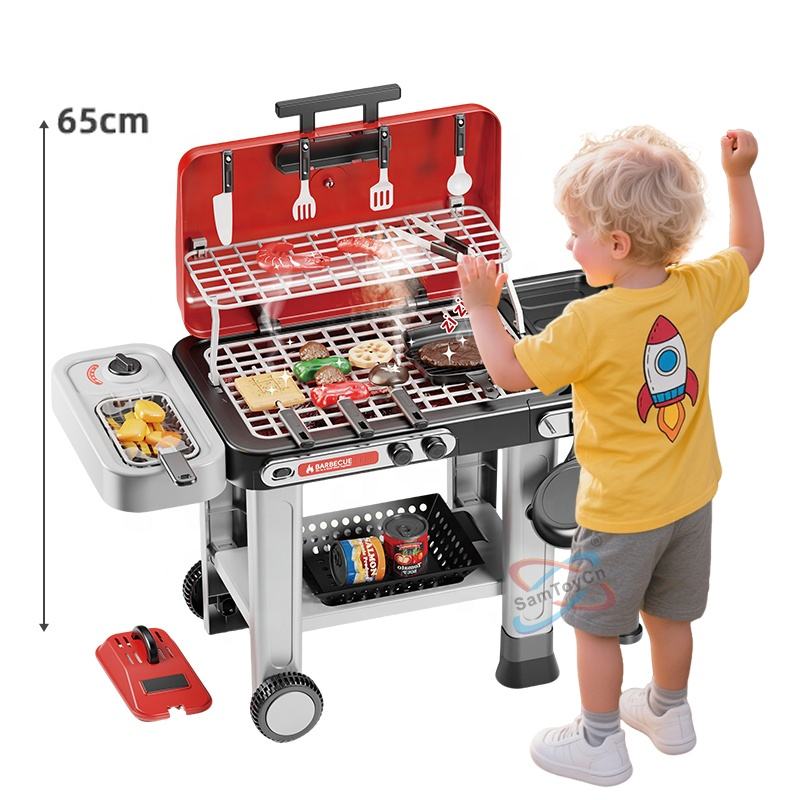The blond-haired, yellow-clad little boy is playing with the red Handcart Barbecue Grill Toy using pliers
