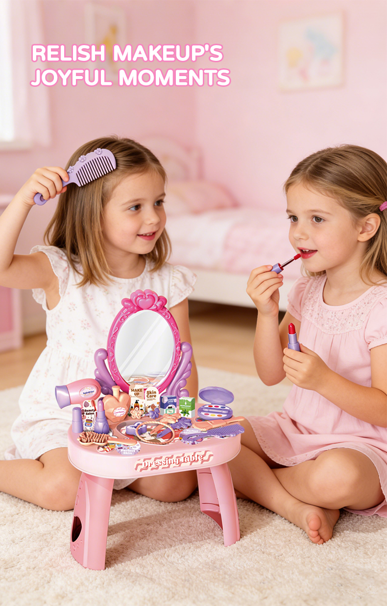 Two little girls sat in a pink room, playing dress-up with a pink vanity set