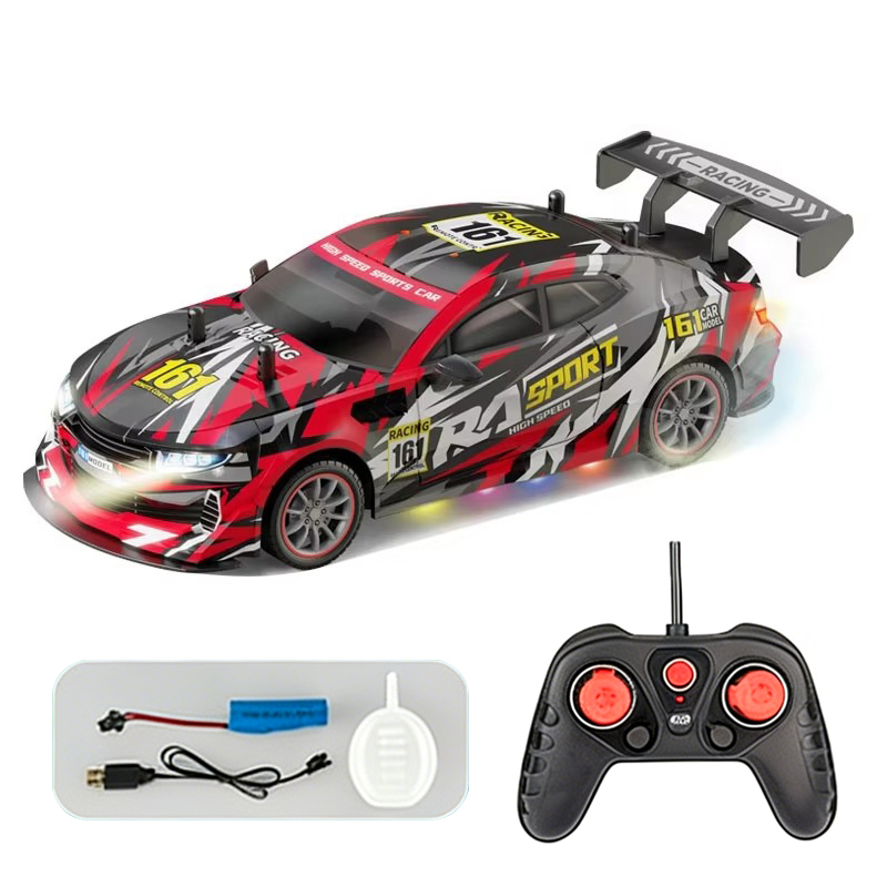 Red 2.4G R/C 4WD Drift Chevrolet Racing Car and accessories including remote control batteries