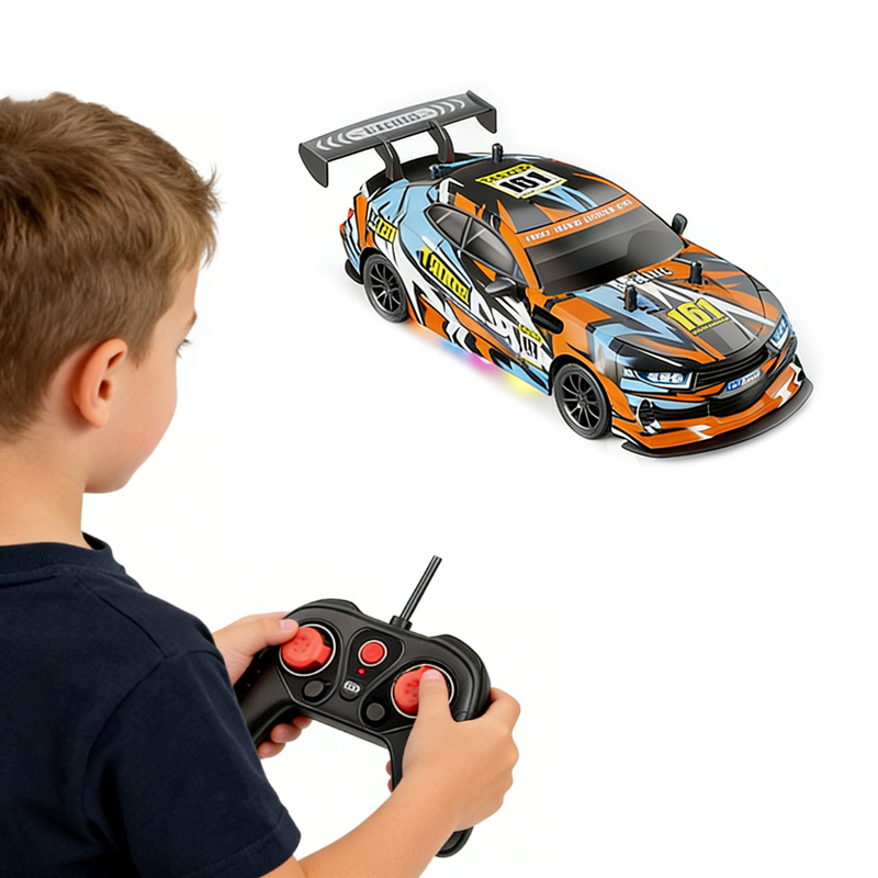 A little boy is playing with an orange Drift Chevrolet Racing Car using a remote control