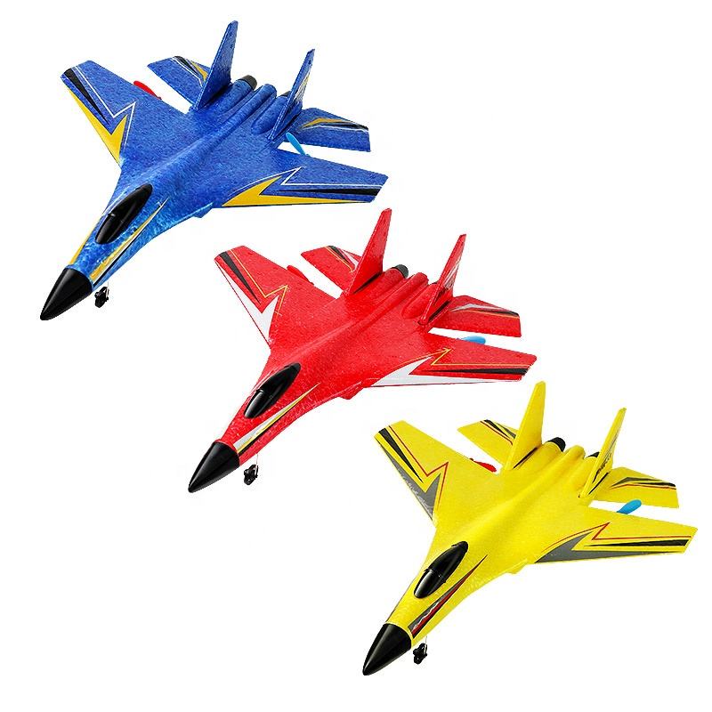 Three different colored foam airplanes: a blue foam airplane, a red foam airplane, and a yellow foam airplane