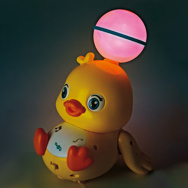 The ball atop the Stunt Head Duck toy glows pink in dark environments