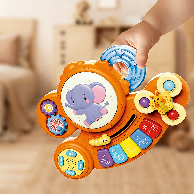 One hand holding an orange elephant Multifunctional Animal Music