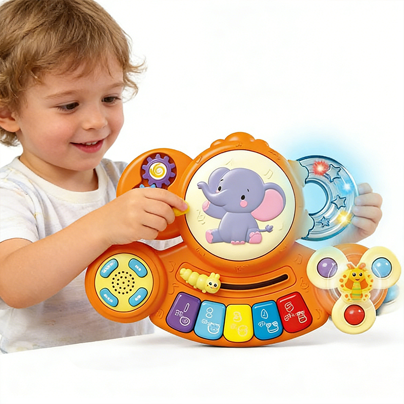 The child plays with the orange elephant Multifunctional Animal Music