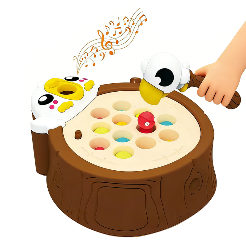 One hand plays with an Electric Insect Fishing Toy that makes music like a woodpecker