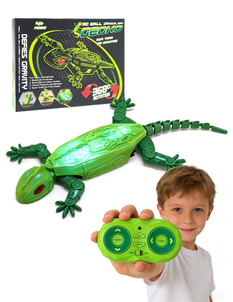 A young boy holds the Wall-Climbing Geckos remote control, with the toy and its packaging beside him