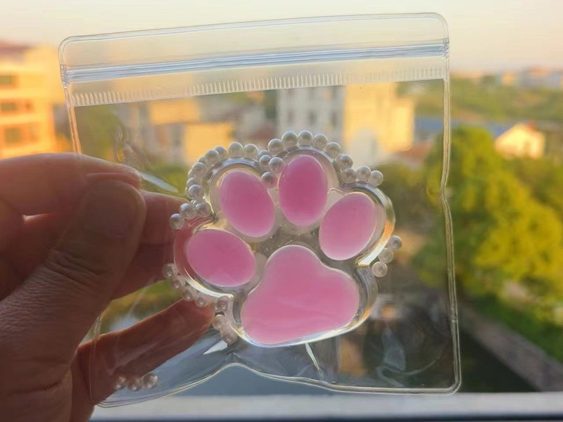 Pinching Fun: Transparent Two-Color Cat Paws