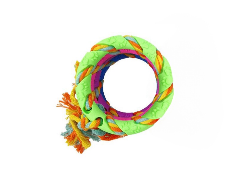 A Large Circular Pet Toy With A Rope