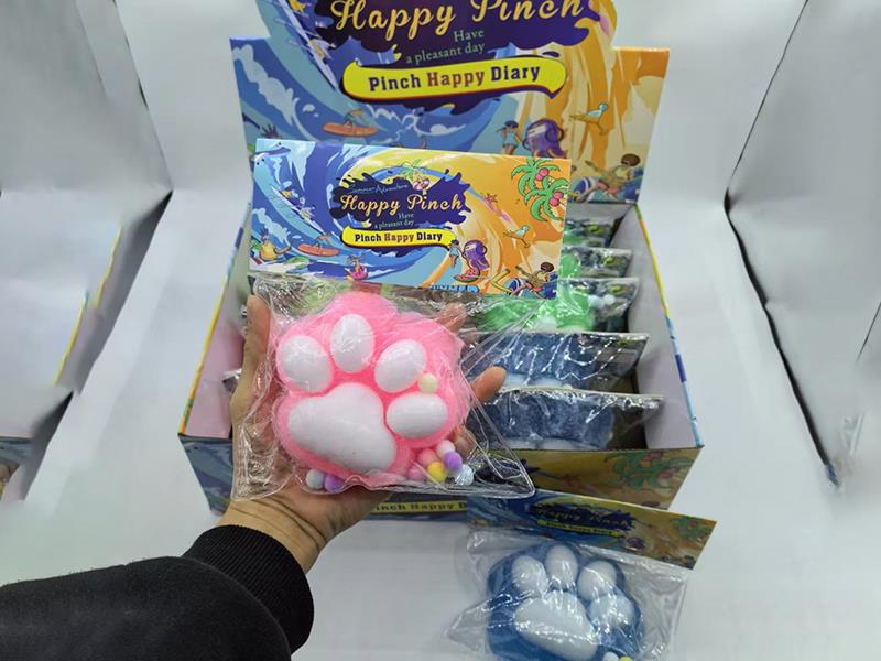 Pinching Fun: 220 Grams Of Big Cat Claws On The Head