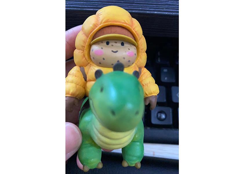 Little Potato Riding A Dinosaur Cartoon Toy