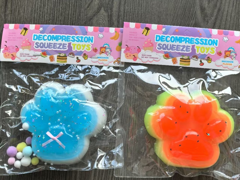 Pinching Fun: Giant Cat Paws In Top And Bottom Colors