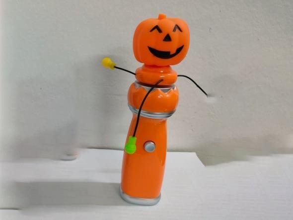Pumpkin Head Swings The Fancy Flashing Stick