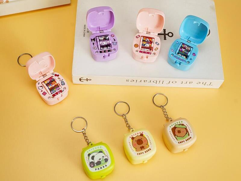 Cartoon Mini Bomb Surprise Box, Stress-Relieving Toy, Creative Sticker Machine Keychain