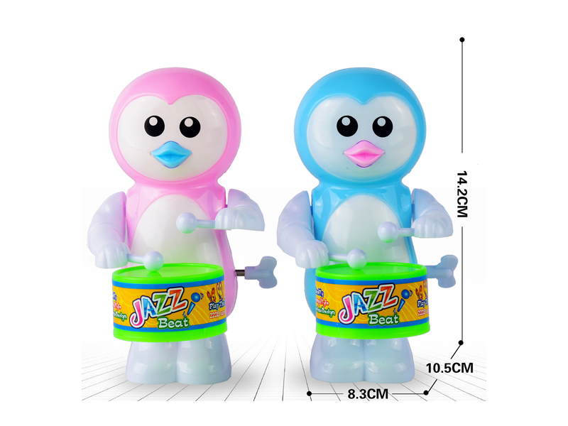 Wind Up Penguin Swinging And Beating Drums