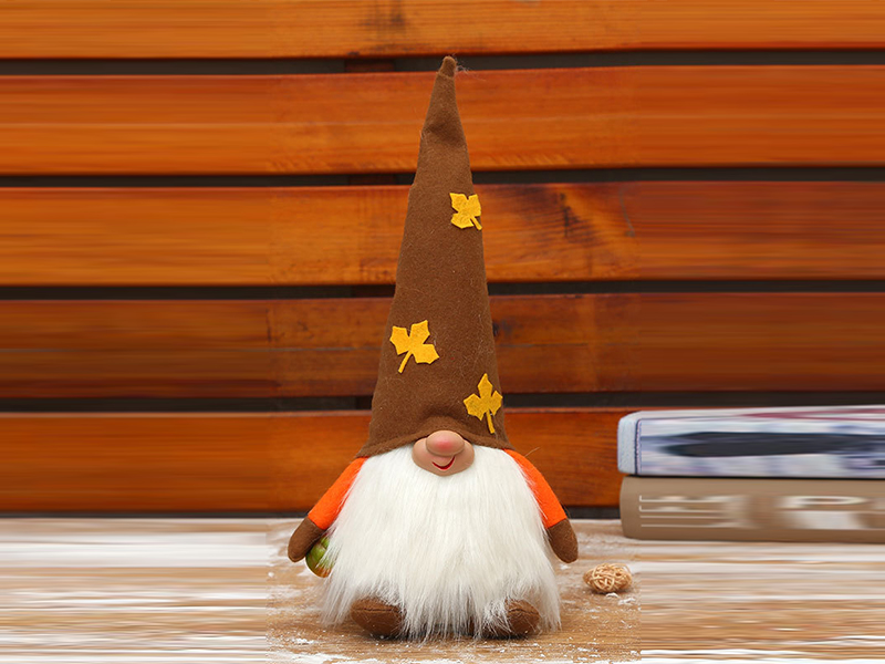 Glowing Brown Maple Leaf Cap Holding Pumpkin