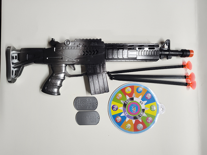 Spray-Painted Needle Gun With Target, Military Badge