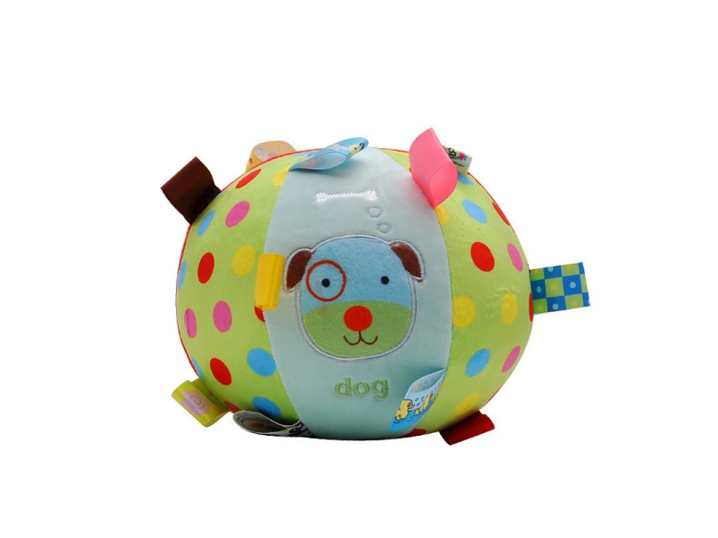 The Baby Comforts The Ringing Bell While The Puppy Grabs The Ball