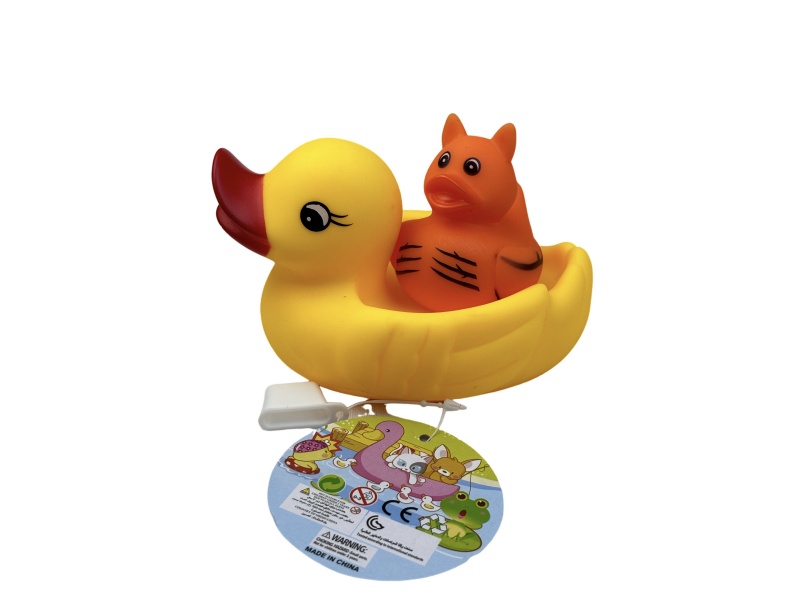 A Little Female Duck Playing In The Bathroom With A Tiger Duck